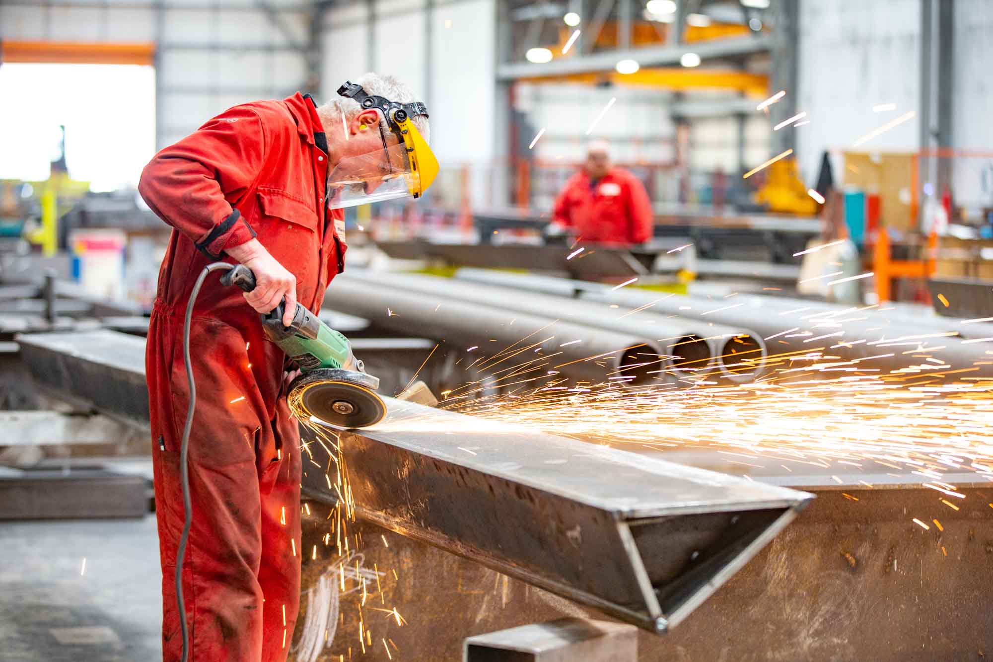 Professional brand photography showing industrial precision and scale
